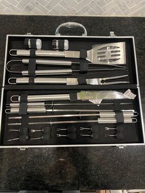 12-Piece Stainless Steel BBQ Tool Set 
Outside carrier is rusting a bit